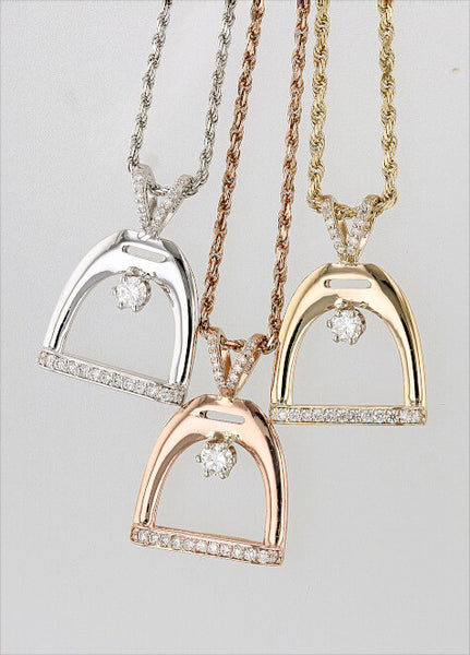 International Stirrup Pendant in 14k gold and diamonds by Lesley Rand Bennett