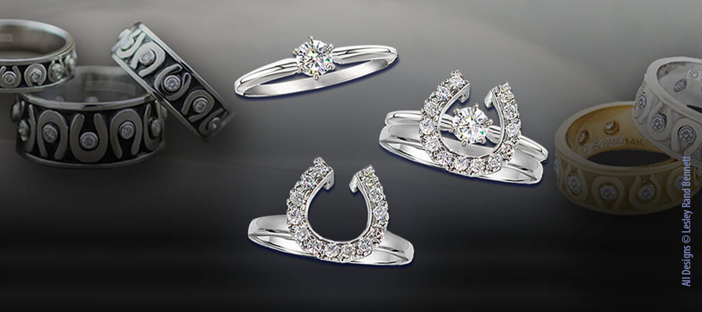Equestrian wedding rings by Lesley Rand Bennett. Horseshoe wedding rings in gold with diamonds.
