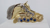 Braided Mane horse bracelet in solid gold with 1 carat of sapphires. this copyrighted design is handcrafted by Lesley Rand Bennett