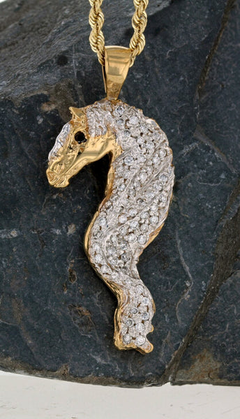 Friesian horse head pendant with long pave mane. by Lesley Rand Bennett