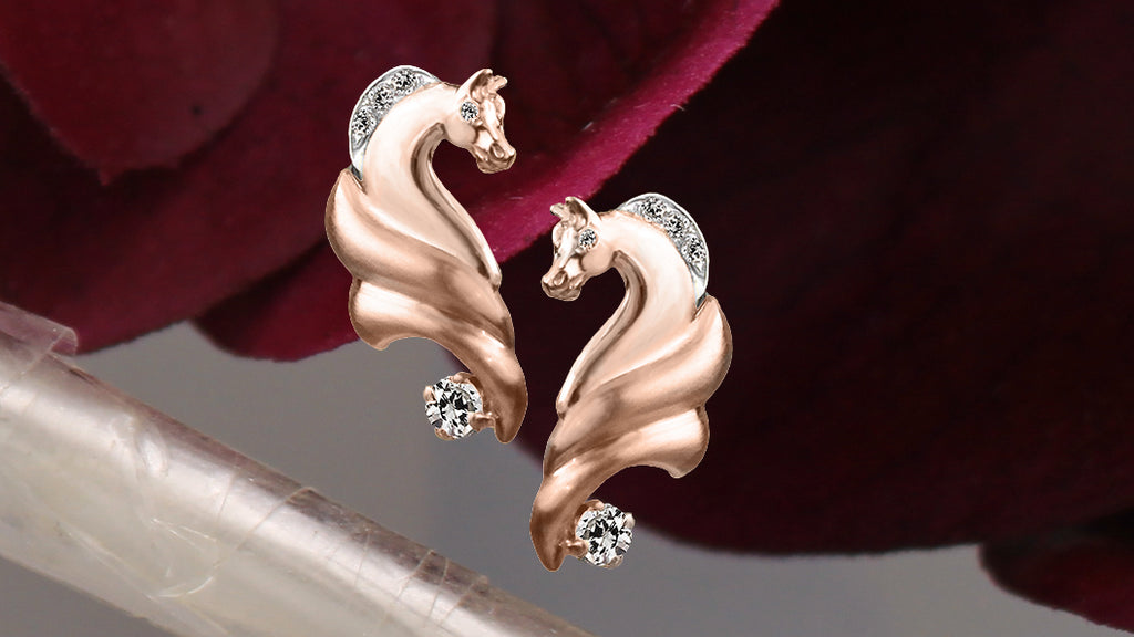 Rose gold horse earrings with diamonds  by Lesley Rand Bennett