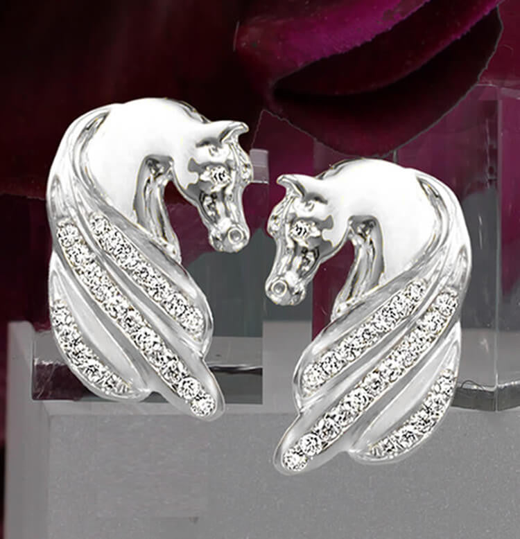 14k white gold Horse head earrings with diamond manes. Handcrafted by Lesley Rand Bennett
