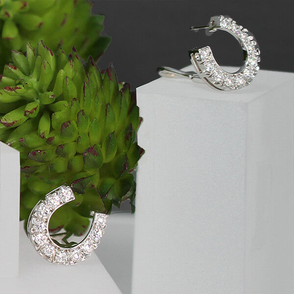 Diamond horse shoe earring handcrafted by Lesley Rand Bennett mid-size1 4k White gold.