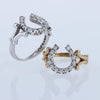 New classic diamond horseshoe rings by Lesley Rand Bennett. Pictured in white gold and yellow gold.