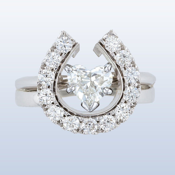 Horseshoe wedding set with Heart diamond solitaire. By Lesley Rand Bennett