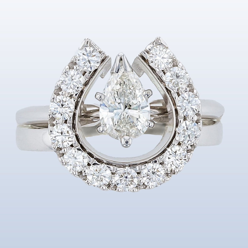 Diamond Horseshoe wedding set with pear shaped diamond solitaire