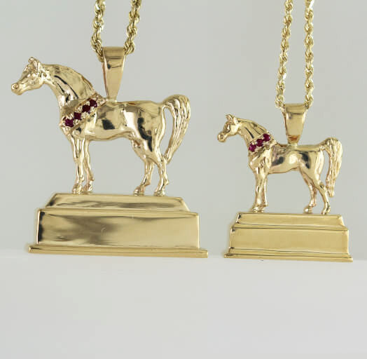 Compare sizes of large and small reserve trophy horse pendant.