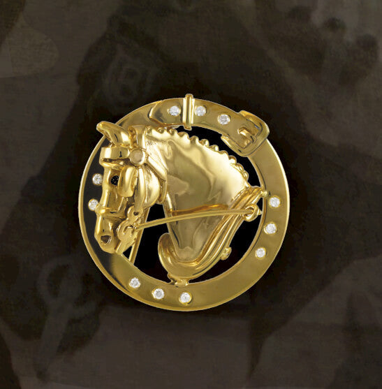 14k driving horse pin. Copyright and design by Lesley Rand Bennett