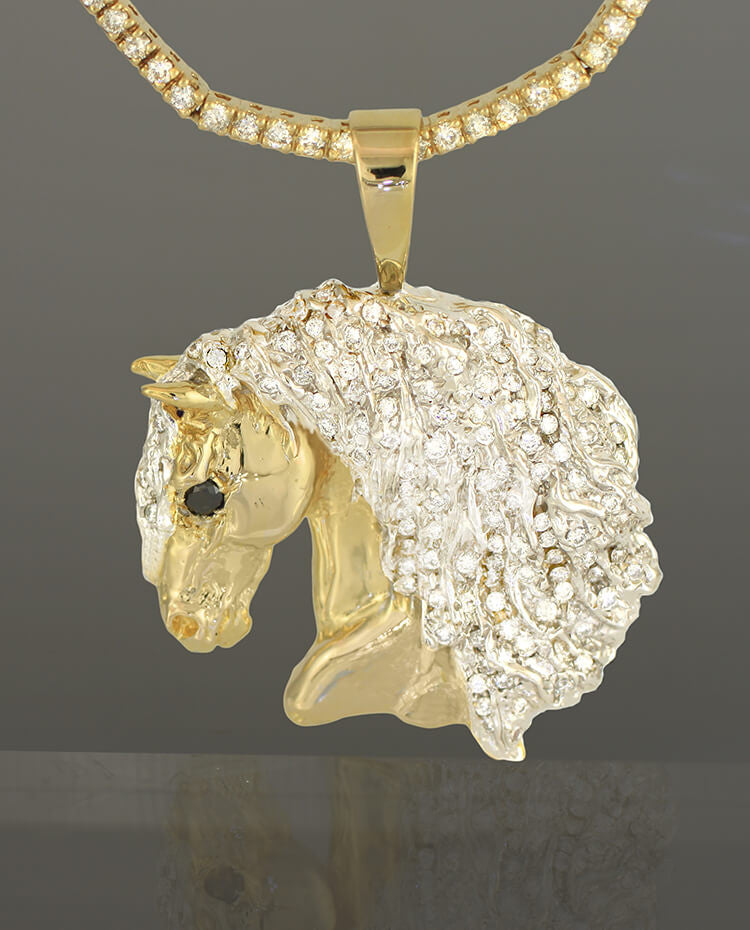 14k gold Friesian Horse head pendant with diamonds. By Lesley Rand Bennett