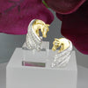 14k white and yellow gold diamond horse head earrings by Lesley Rand Bennett